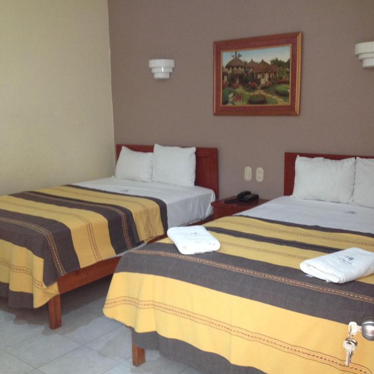 Postel nebo postele na pokoji v ubytování Hotel El Español Centro Historico