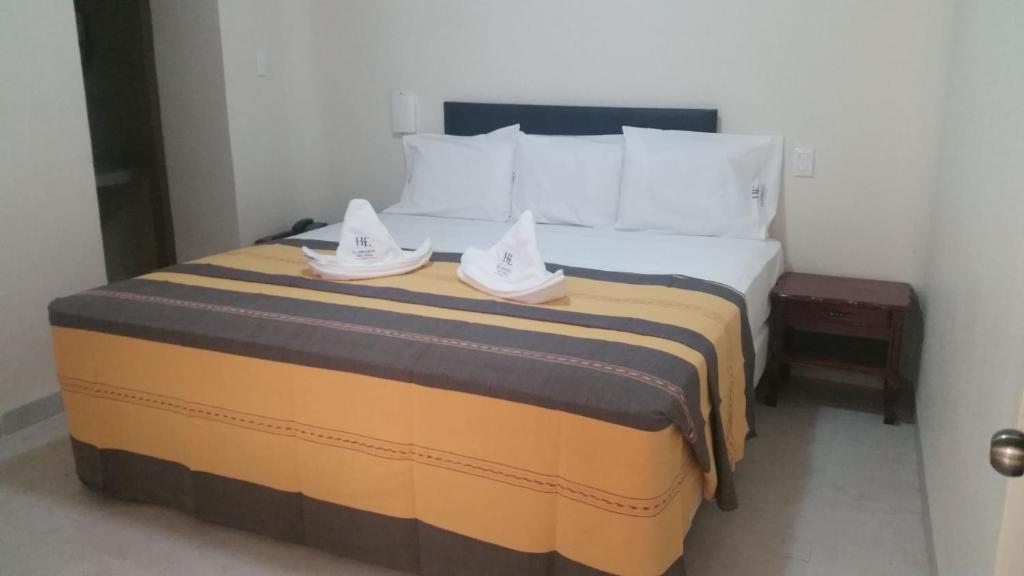 Postel nebo postele na pokoji v ubytování Hotel El Español Centro Historico