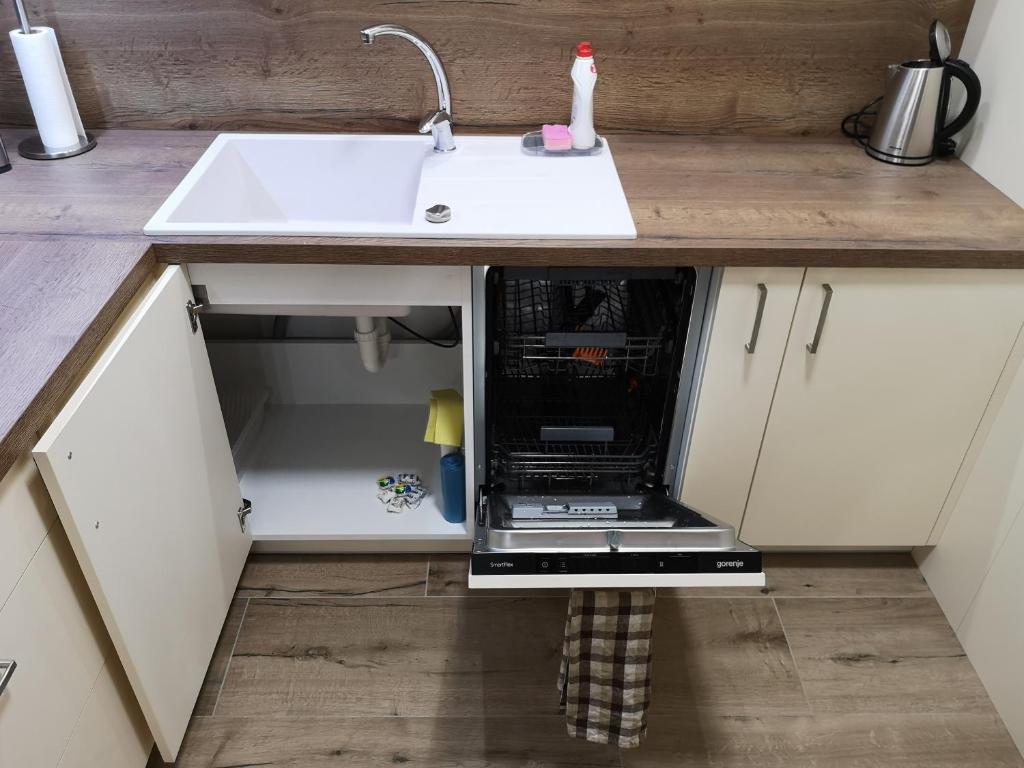 Kuchyňa alebo kuchynka v ubytovaní Romantic Chopok Juh Apartment 22