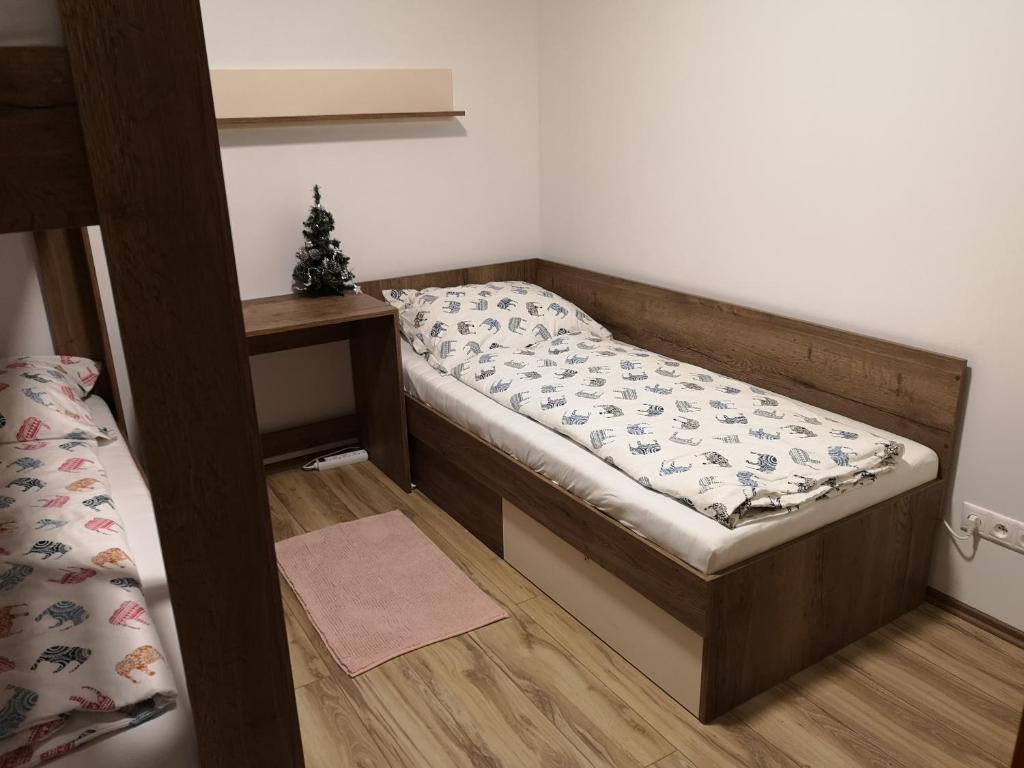 Posteľ alebo postele v izbe v ubytovaní Romantic Chopok Juh Apartment 22