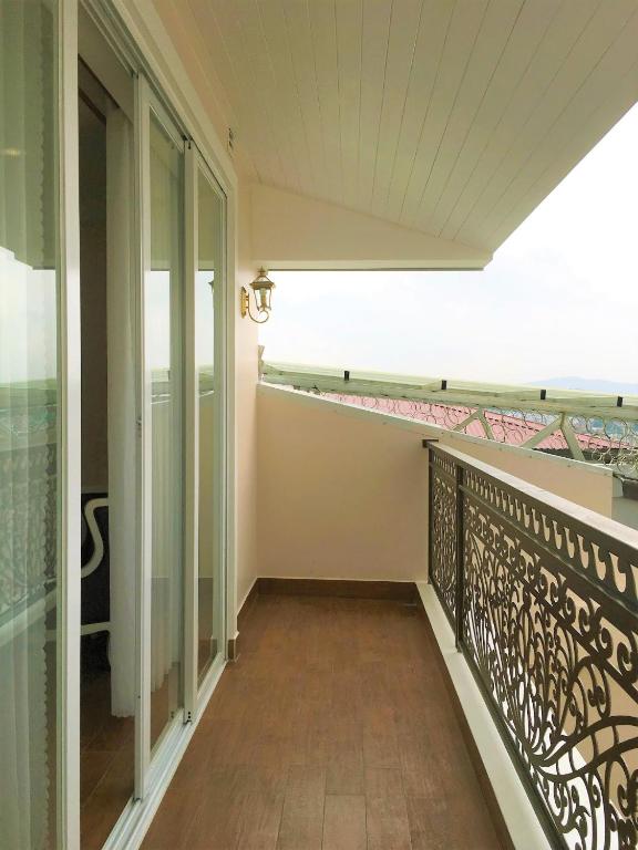 Balkón nebo terasa v ubytování Carita Hotel
