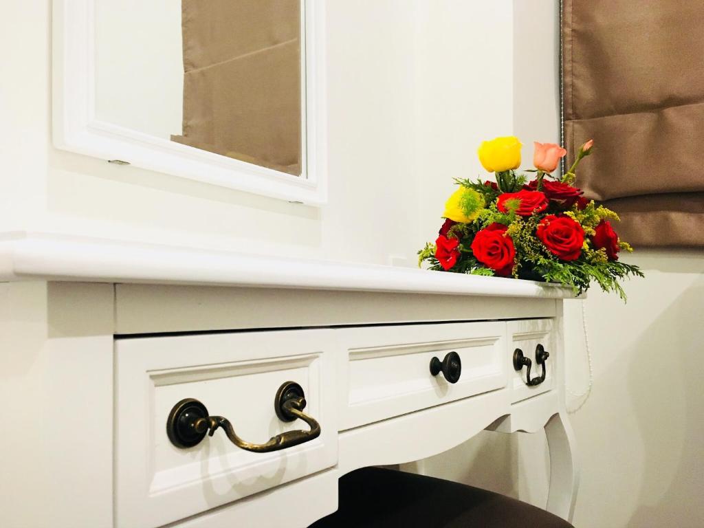 Kuchyň nebo kuchyňský kout v ubytování Carita Hotel