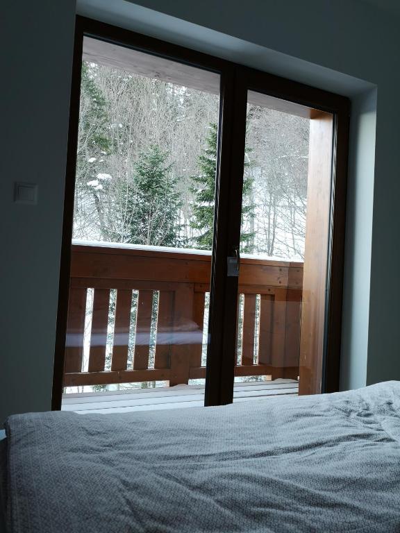 Posteľ alebo postele v izbe v ubytovaní Romantic Chopok Juh Apartment 22