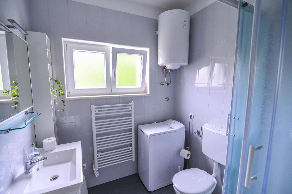 Kúpeľňa v ubytovaní Apartments An Ni