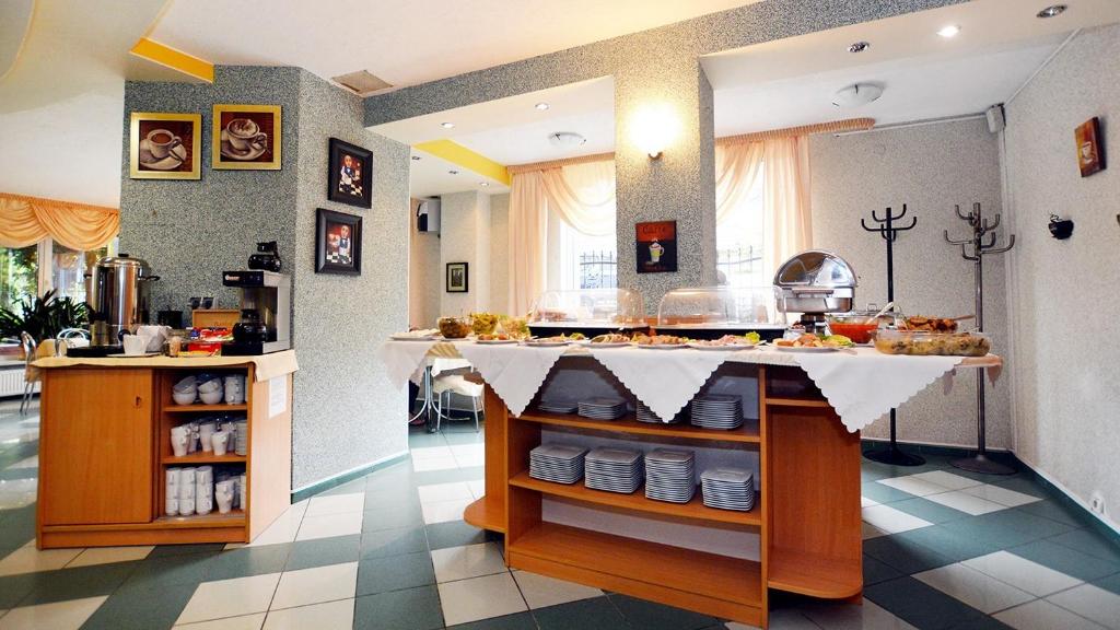 Kuchyňa alebo kuchynka v ubytovaní Apartamenty Rok