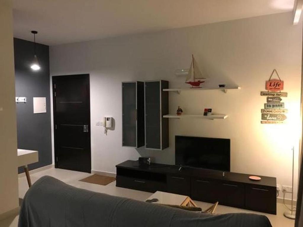 TV a/nebo společenská místnost v ubytování Ocean View, Apartment 1