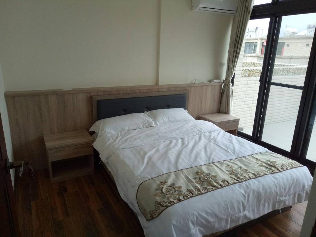 Postel nebo postele na pokoji v ubytování Bigger B&B