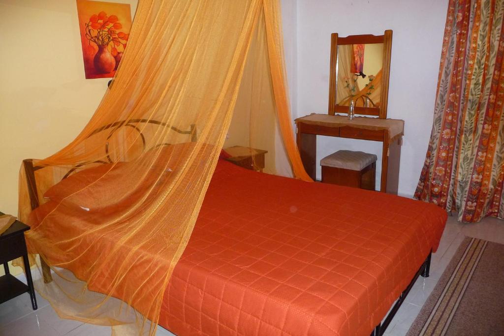 Postel nebo postele na pokoji v ubytování Maritsas Apartments