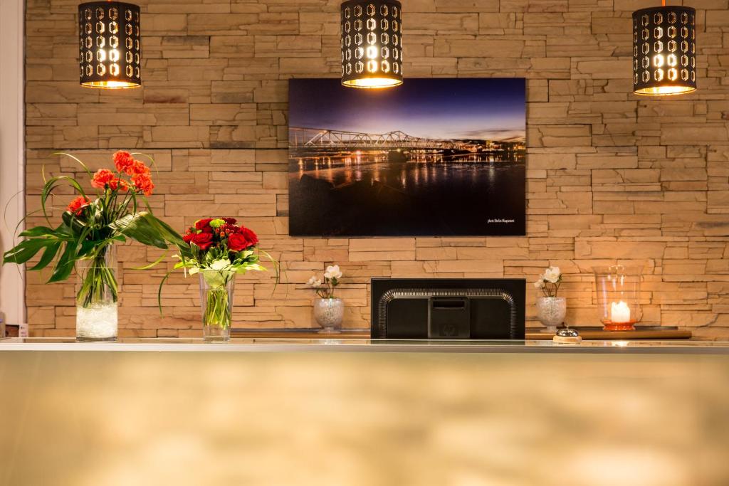 TV a/nebo společenská místnost v ubytování Park Hotel Tornio