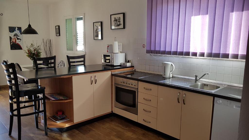 Kuchyňa alebo kuchynka v ubytovaní Apartments Elda