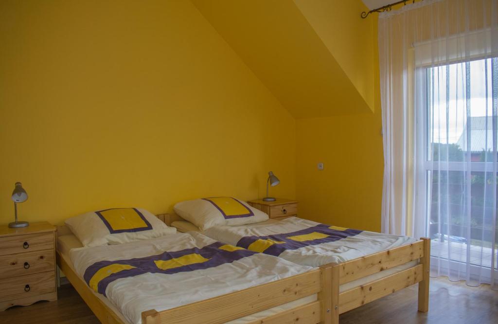 Postel nebo postele na pokoji v ubytování Agroturystyka na Kaszubach