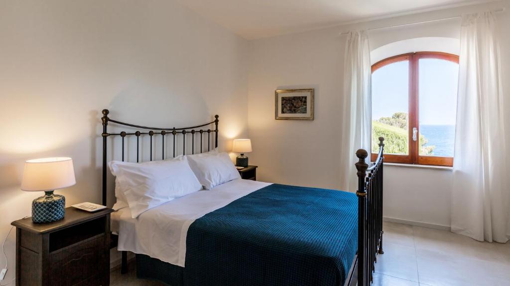 La Matrangela Charme Apartments客房内的一张或多张床位