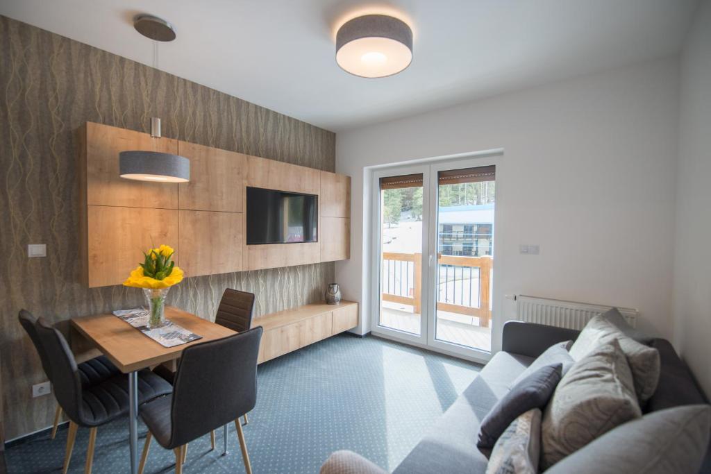 TV a/nebo společenská místnost v ubytování ff apartments Jasná Lúčky
