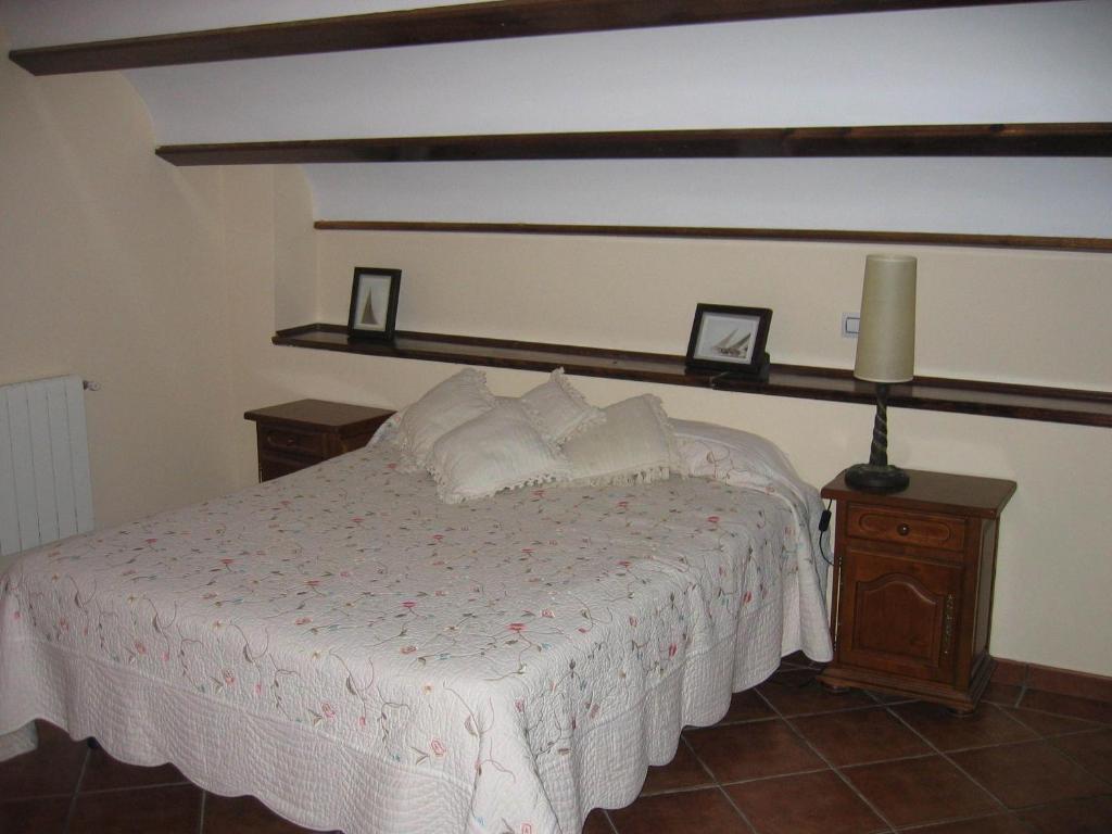 Postel nebo postele na pokoji v ubytování Apartamentos El Pajar del Abuelo