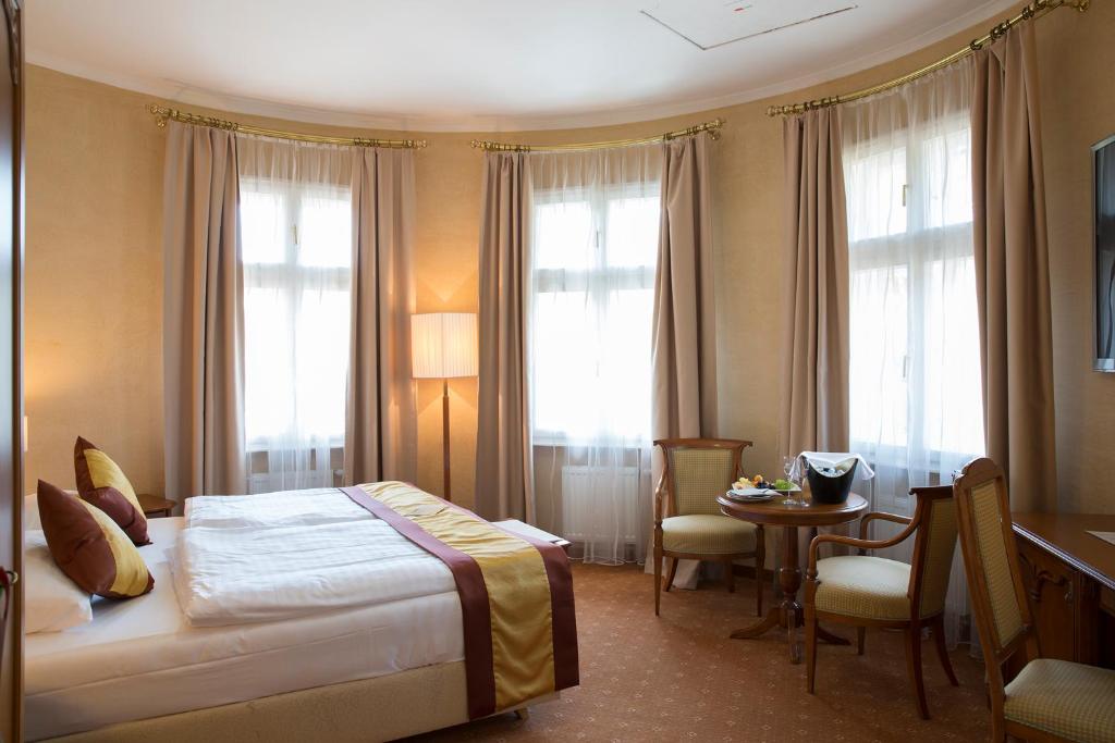 Postel nebo postele na pokoji v ubytování Hotel Sacher Baden