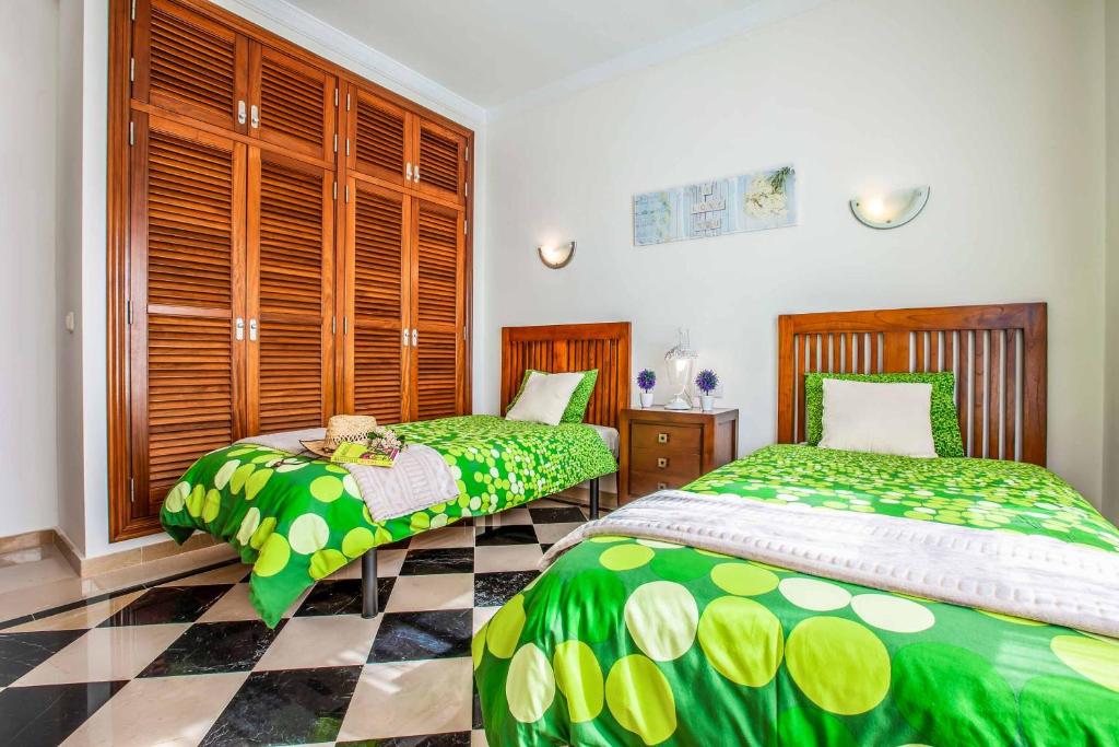 Postel nebo postele na pokoji v ubytování Villa Silvana
