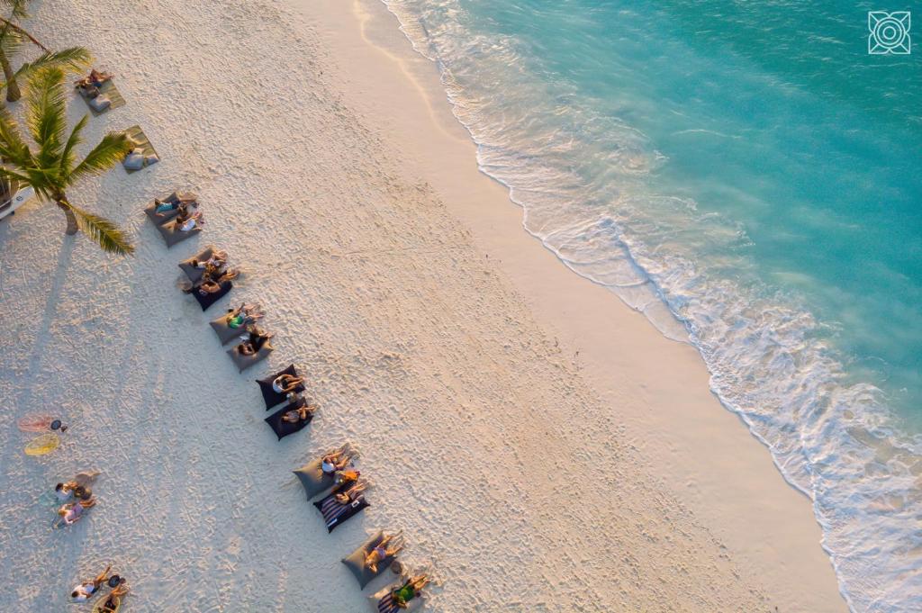 an overhead view of a beach with a group of people at Zuri Zanzibar in Kendwa