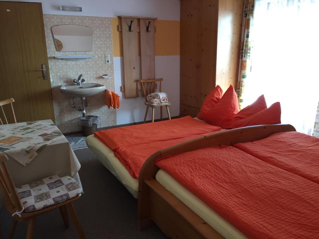 Postel nebo postele na pokoji v ubytování Haus Holaus Helga