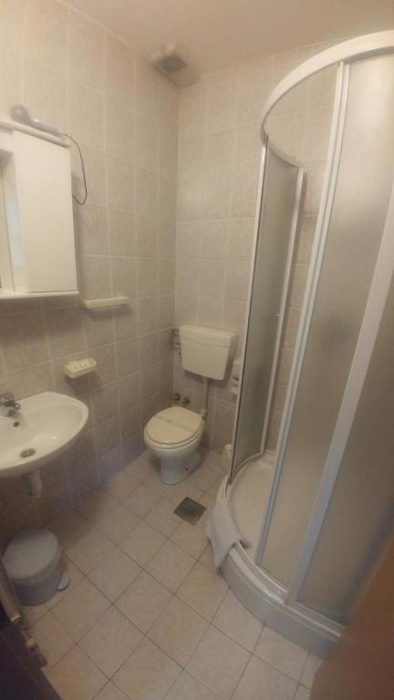 Koupelna v ubytování Hotel Delminium