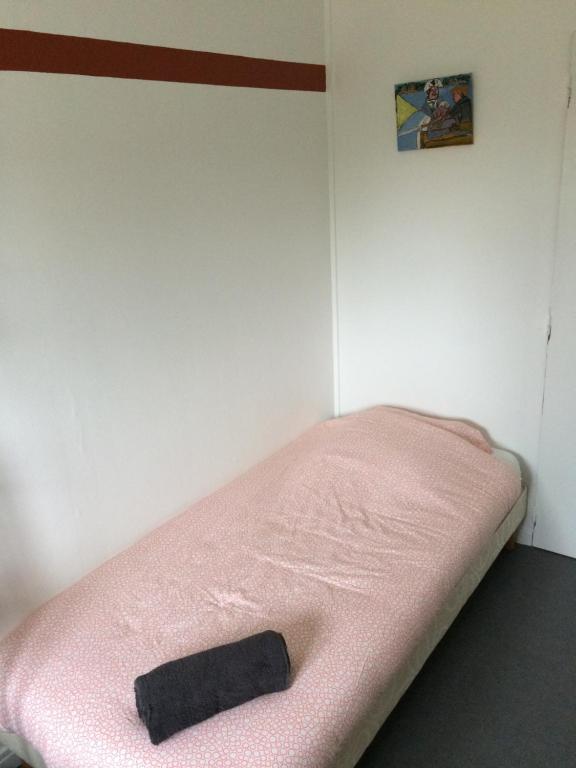 Postel nebo postele na pokoji v ubytování Relais Maximilien