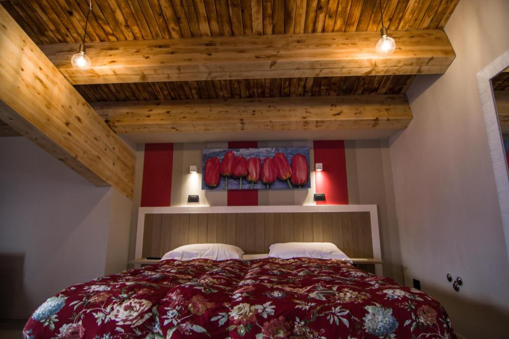 Posteľ alebo postele v izbe v ubytovaní Hotel Laghetto