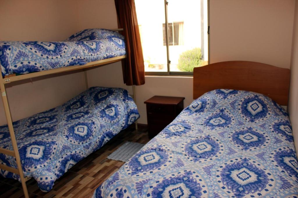 Voodi või voodid majutusasutuse Cabanas Via Nautica toas