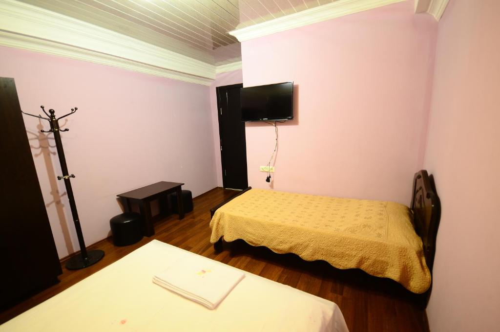 Postel nebo postele na pokoji v ubytování Hotel Peria