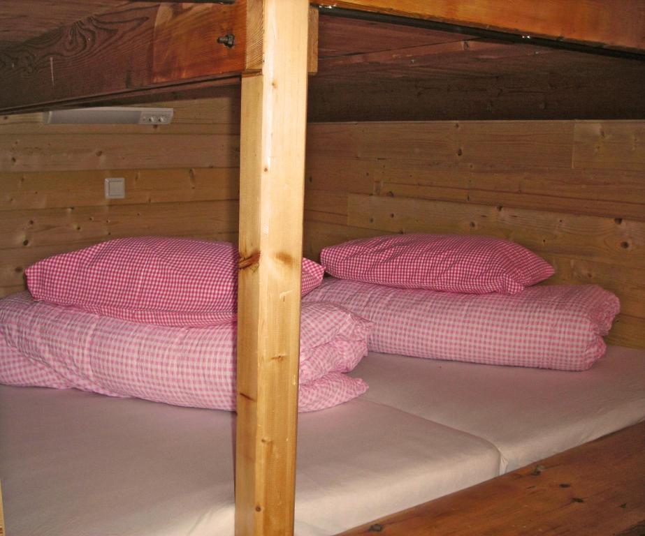Postel nebo postele na pokoji v ubytování Skihütte Zams