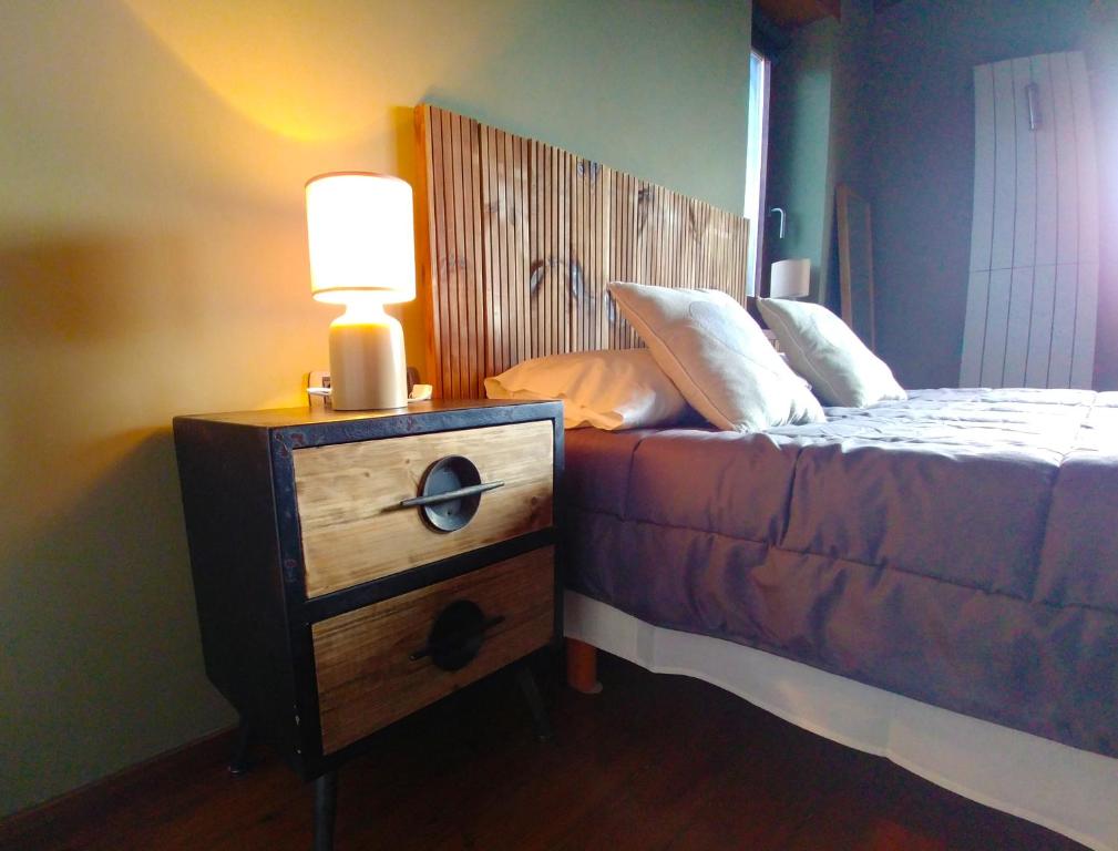 Postel nebo postele na pokoji v ubytování CasaCampelles I - Vall de Núria - Ripollès