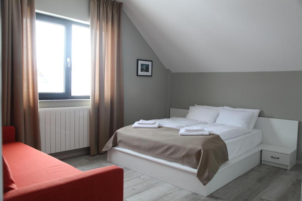 Кровать или кровати в номере Double House Bakuriani
