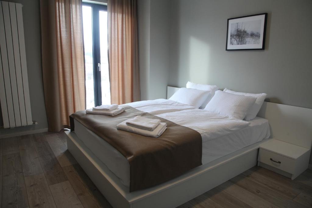 Кровать или кровати в номере Double House Bakuriani