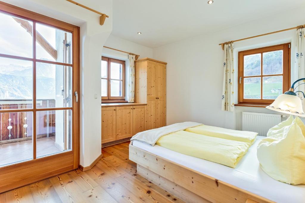 Postel nebo postele na pokoji v ubytování Gasserhof