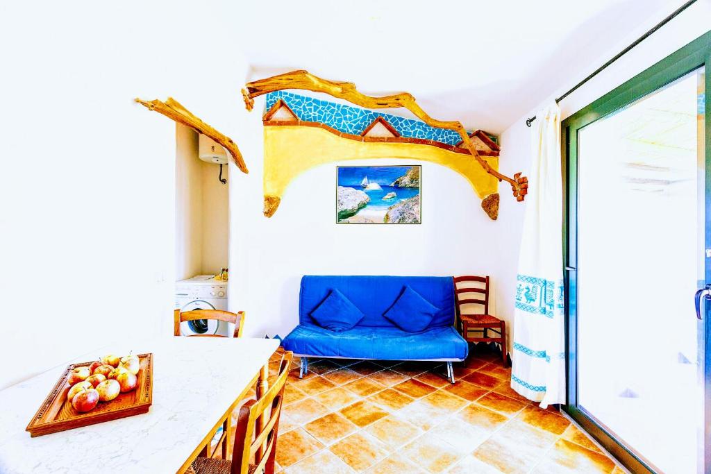 Postel nebo postele na pokoji v ubytování Orosei RE - Il Paradiso degli Ulivi con PISCINA e vista mare
