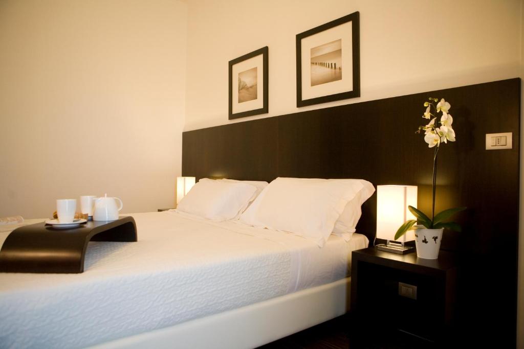 Postel nebo postele na pokoji v ubytování Hotel Tiffany & Resort