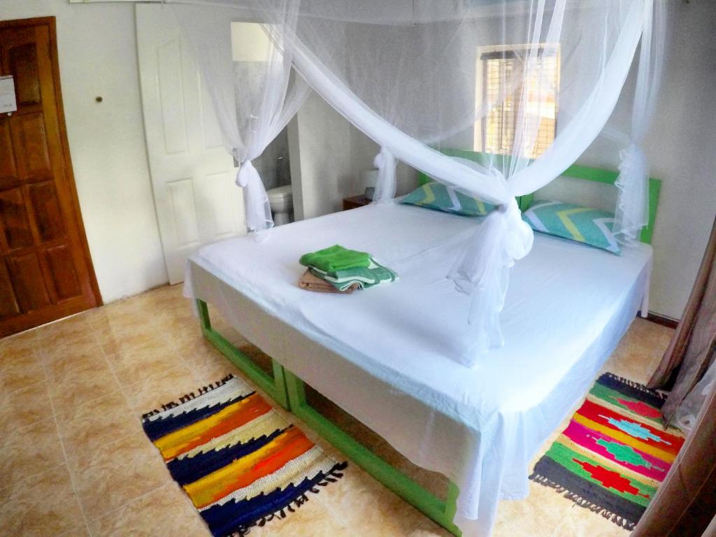 Postel nebo postele na pokoji v ubytování Surf House