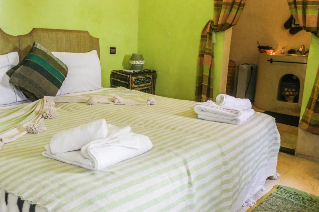 Postel nebo postele na pokoji v ubytování Riad Minorisa
