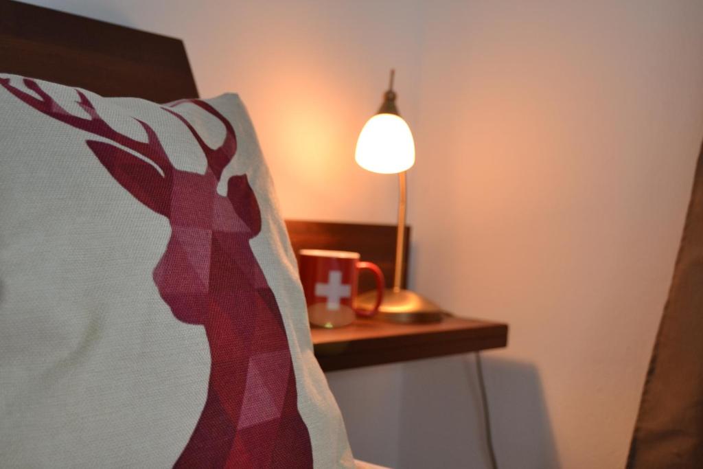 Voodi või voodid majutusasutuse Mountain Lodge Sedrun toas