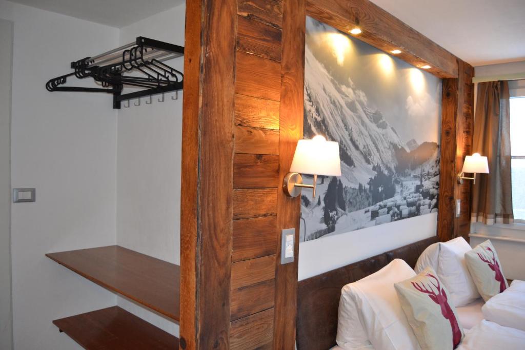 Voodi või voodid majutusasutuse Mountain Lodge Sedrun toas