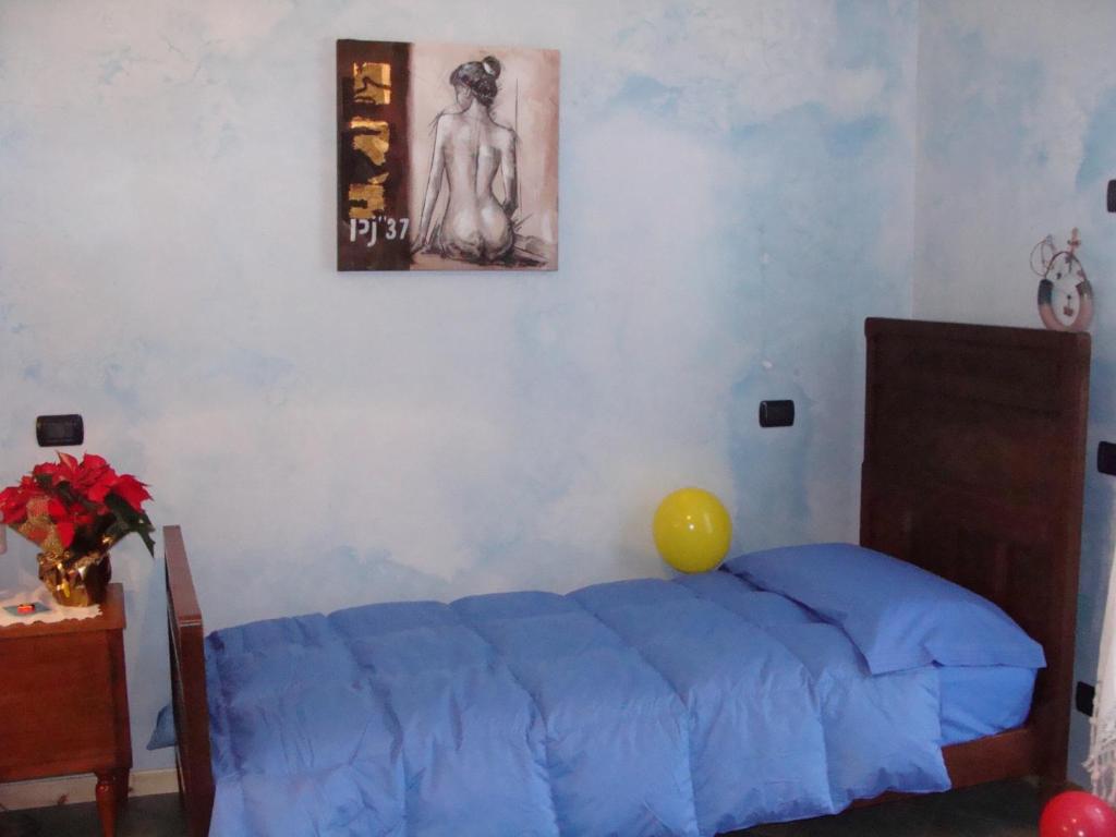 Posteľ alebo postele v izbe v ubytovaní La Coccinella B&B
