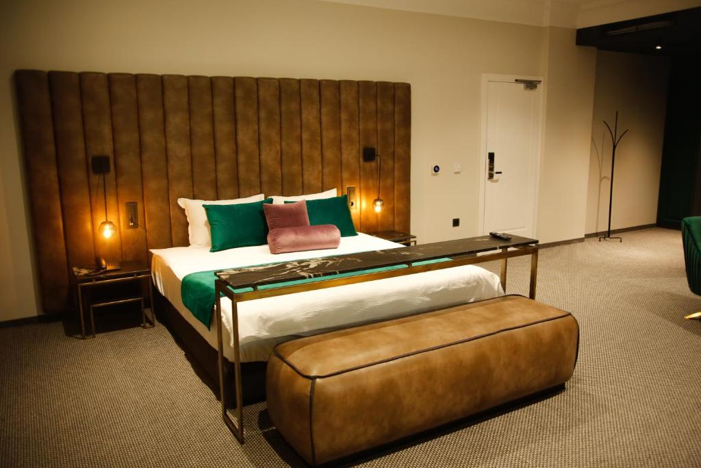 Postel nebo postele na pokoji v ubytování Hotel Rubis