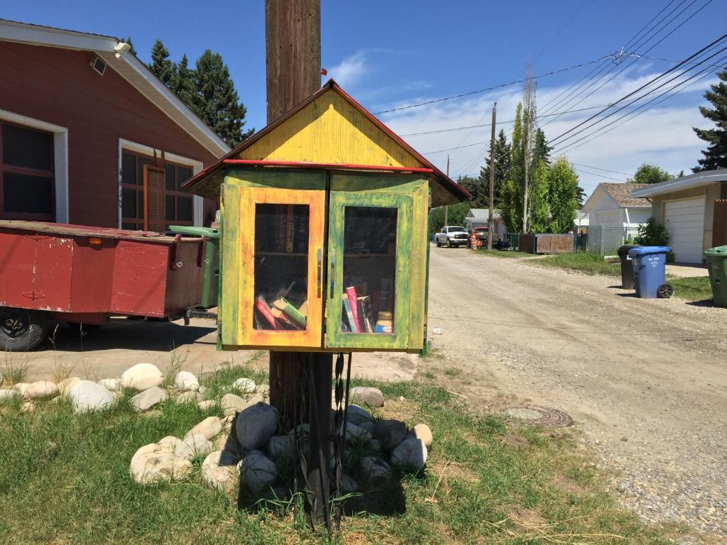 a bird house on top of a telephone pole at The Calgary Hub hostel style Home in Calgary