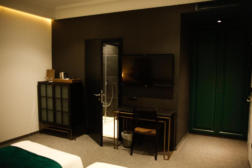 Postel nebo postele na pokoji v ubytování Hotel Rubis