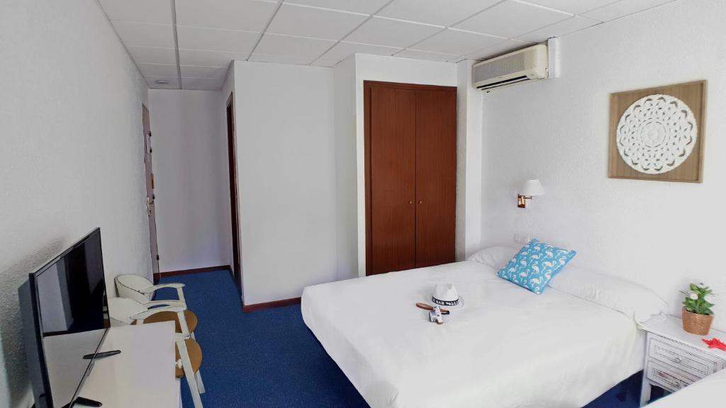 TV a/nebo společenská místnost v ubytování Hotel Mireia