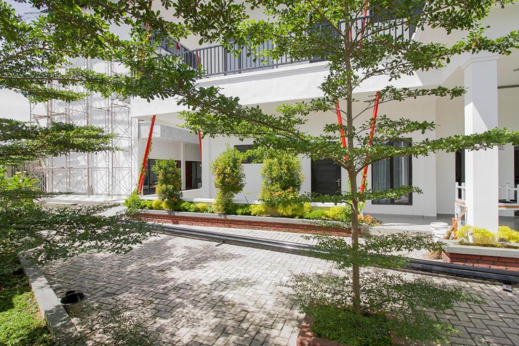 Zahrada ubytování RedDoorz Premium @ Setiabudi Medan