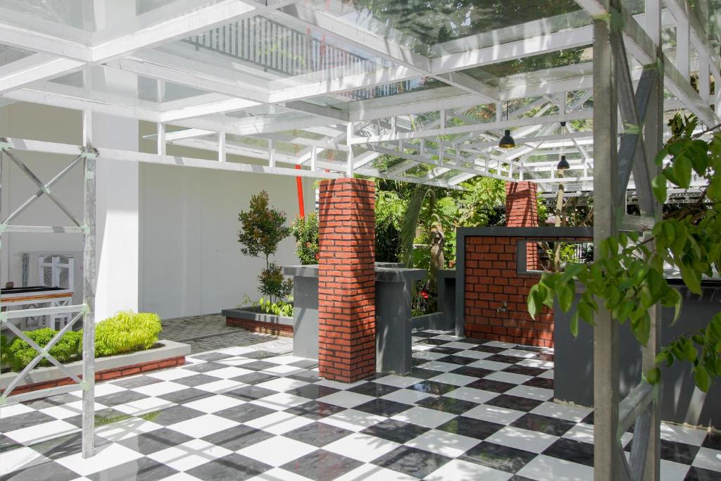 Zahrada ubytování RedDoorz Premium @ Setiabudi Medan