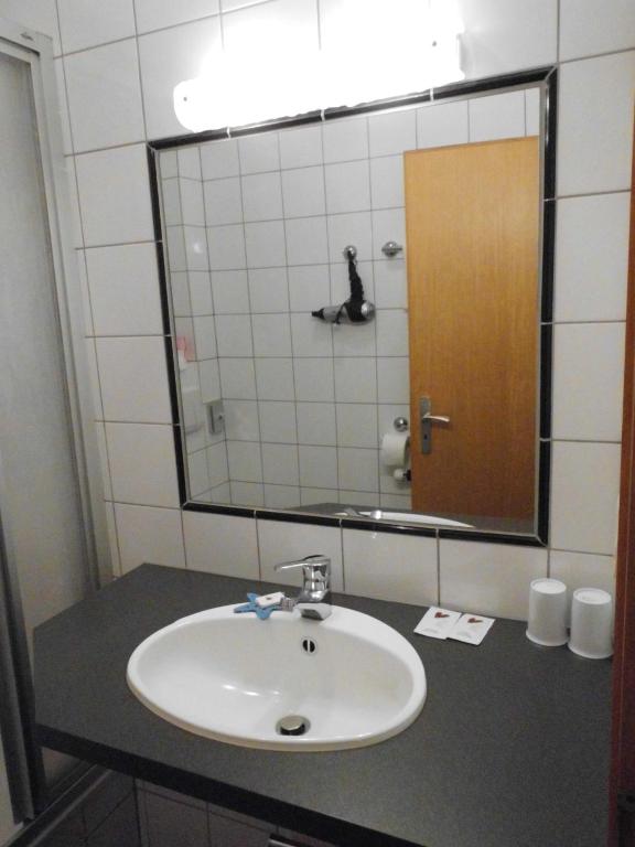 Koupelna v ubytování Hotel Haus Hellhohl Garni