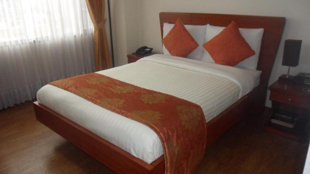 Postel nebo postele na pokoji v ubytování Hotel Splendor by Friends Company