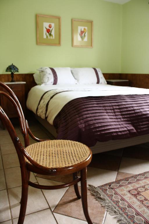 Uma cama ou camas num quarto em Hostal Cepa Noble