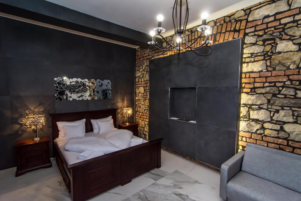 Postel nebo postele na pokoji v ubytování Boutique Hotel Annuska