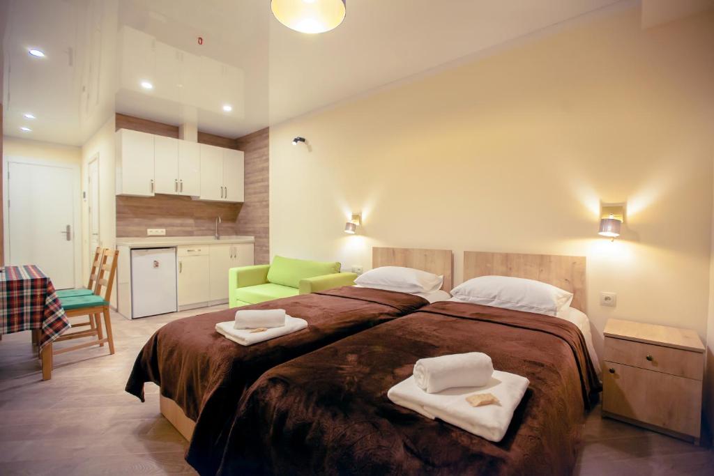 Ένα ή περισσότερα κρεβάτια σε δωμάτιο στο Cozy appartement, loft2 in New Gudauri